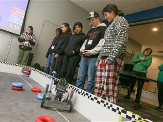 Solano Robotics students at final competition students building robots