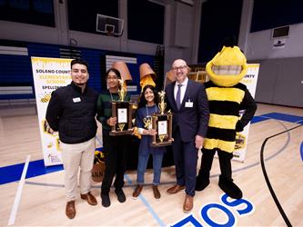 Spelling Bee winners with Travis Credit Union, Associate Superintendent of Human Resources Manolo Garcia, and SCOE BEE