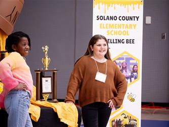 Spellers pose with the trohpies before competition